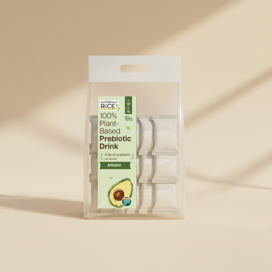 A clear plastic bag of NutriNaturel Rice 100% Plant-Based Prebiotic Drink in Avocado flavor, containing six individual packets arranged in a grid. The packaging features a white header with a handle and a light green label with an avocado illustration.