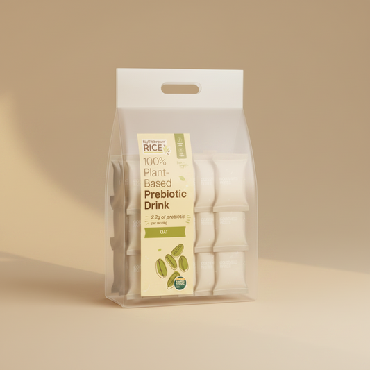 A package of NutriBrown Rice 100% Plant-Based Prebiotic Drink in Oat flavor, containing 12 individual sachets visible through a clear plastic bag with a white header.